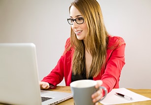 Female working in front of a computer